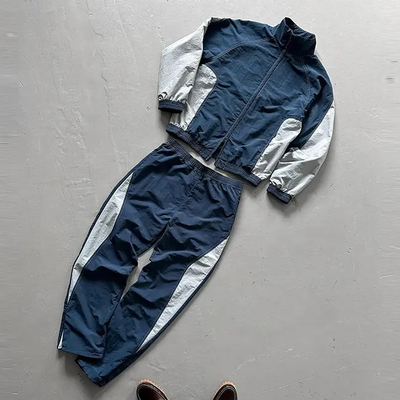 Buy Custom Wind Breaker Tracksuit Baggy Mens Jogging Suit Oversized Polyester Nylon Tracksuit Windbreaker Tracksuit Set Men online manufacture