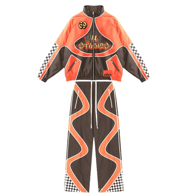 Buy Custom Color Blocked Sweatsuits Cut And Sew Men's Patchwork Track Nylon Windbreaker Tracksuit online manufacture